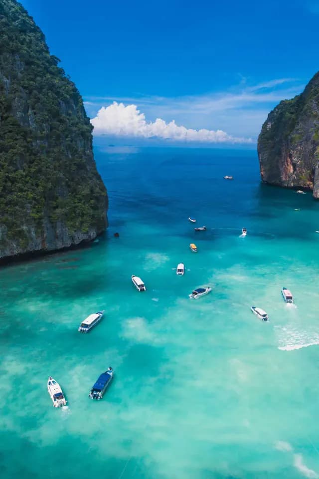 Scenic view of Maya Bay, Thailand with crystal clear waters and limestone cliffs