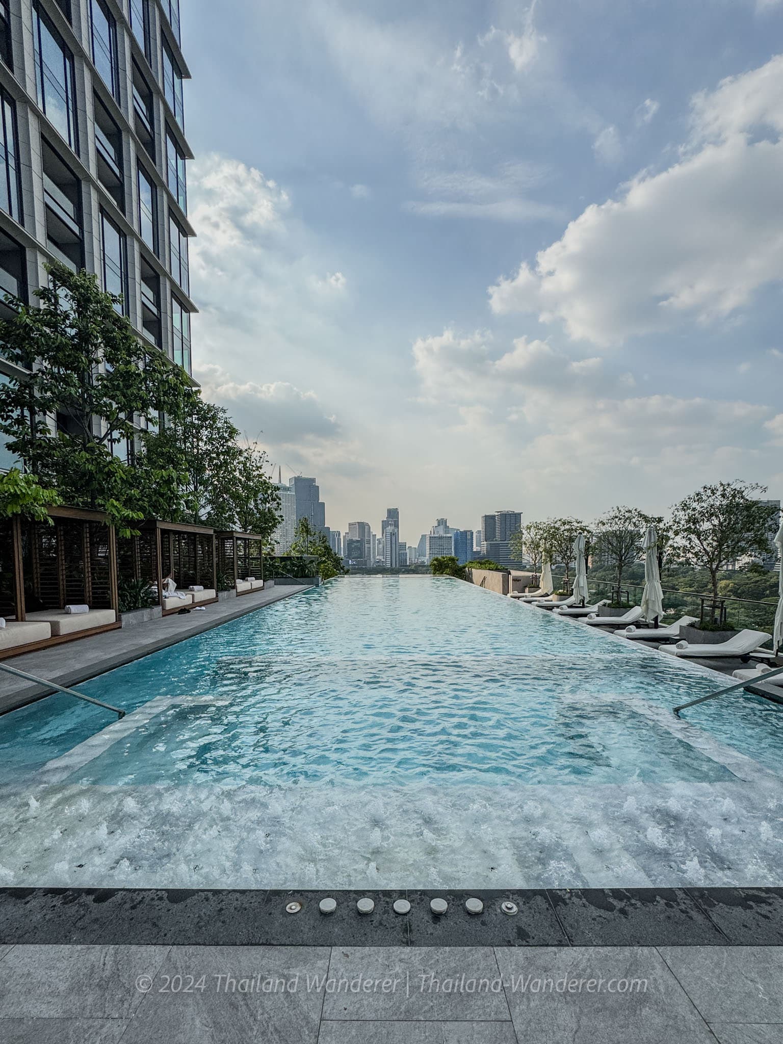 Pool with skyline view at The Ritz-Carlton Bangkok