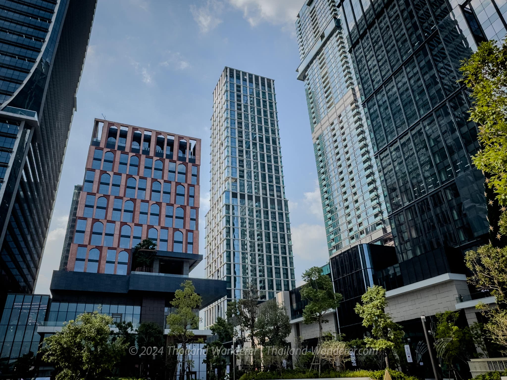 Skyline view of The Ritz-Carlton Bangkok surrounded by skyscrapers