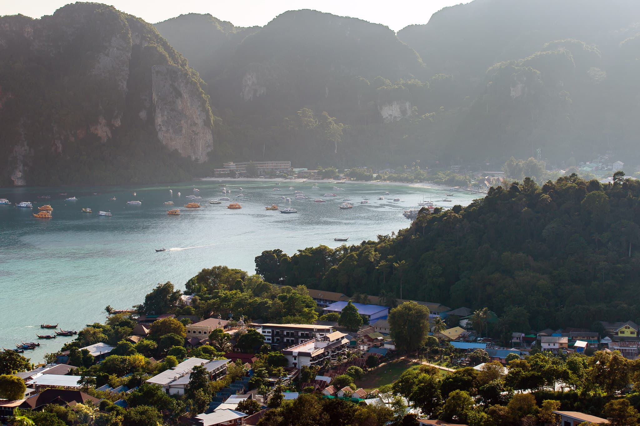 A panoramic view of Koh Phi Phi's turquoise waters and limestone cliffs