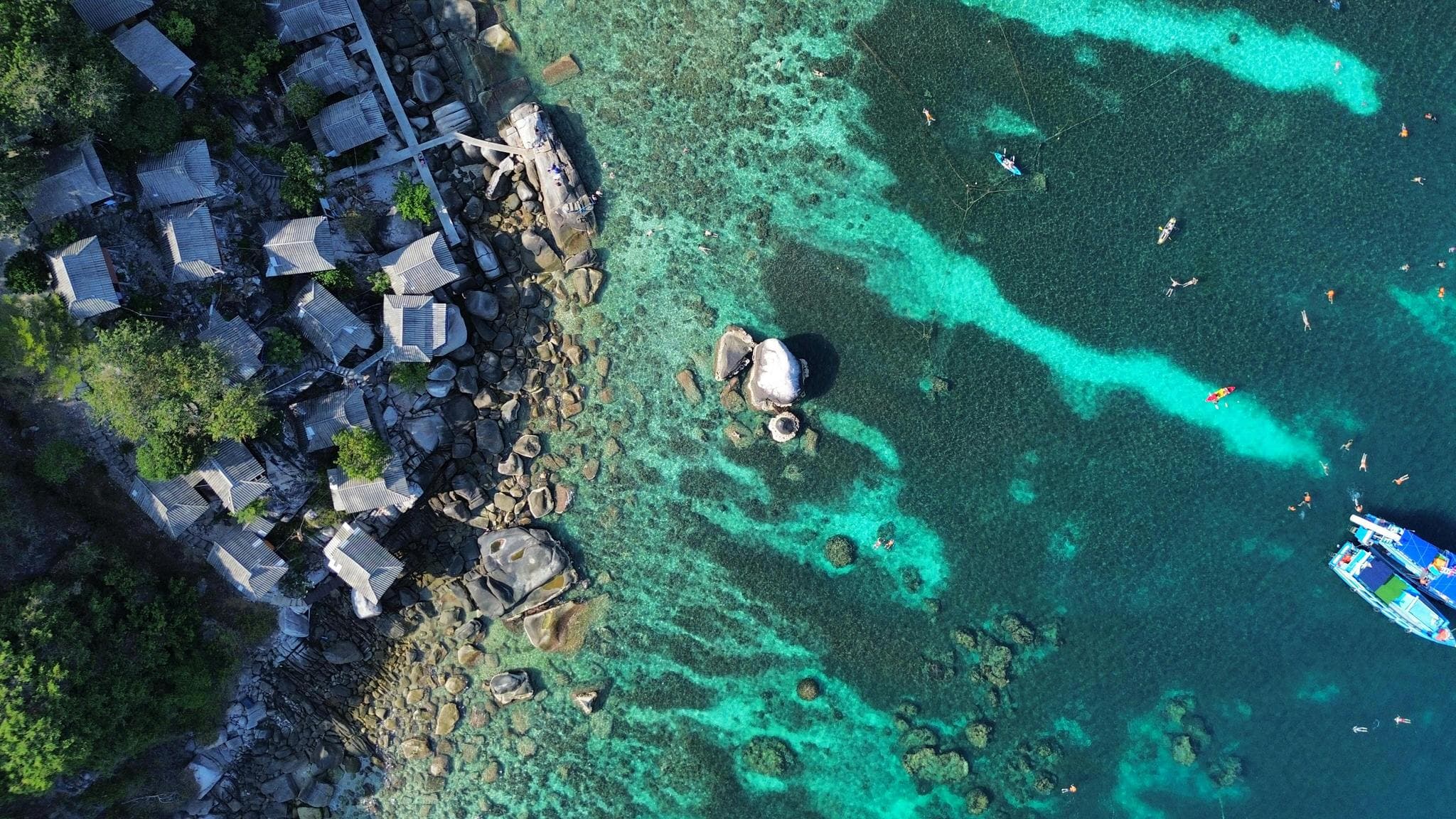 Crystal-clear waters at Shark Bay in Koh Tao