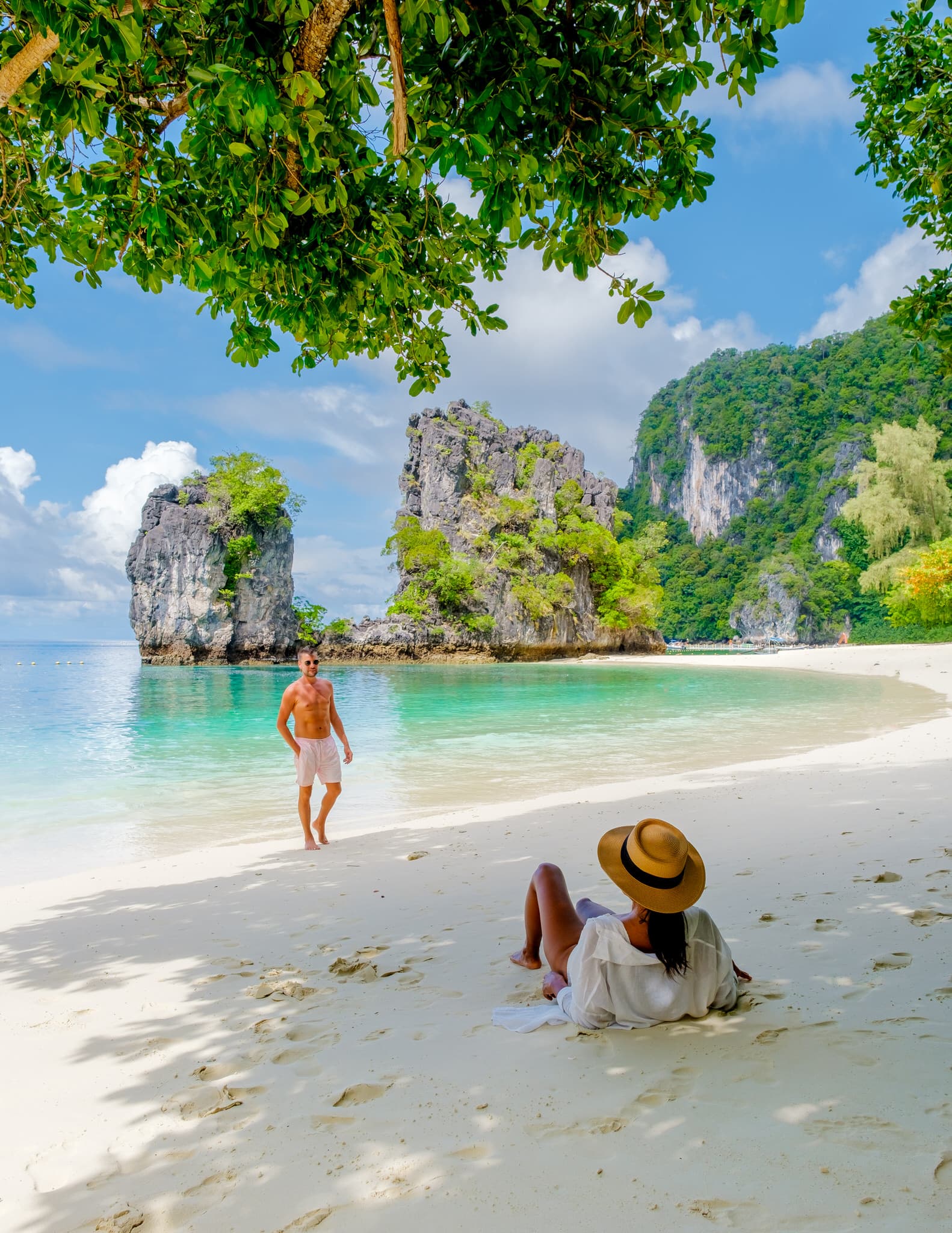 Koh Hong lagoon with emerald green waters surrounded by limestone cliffs