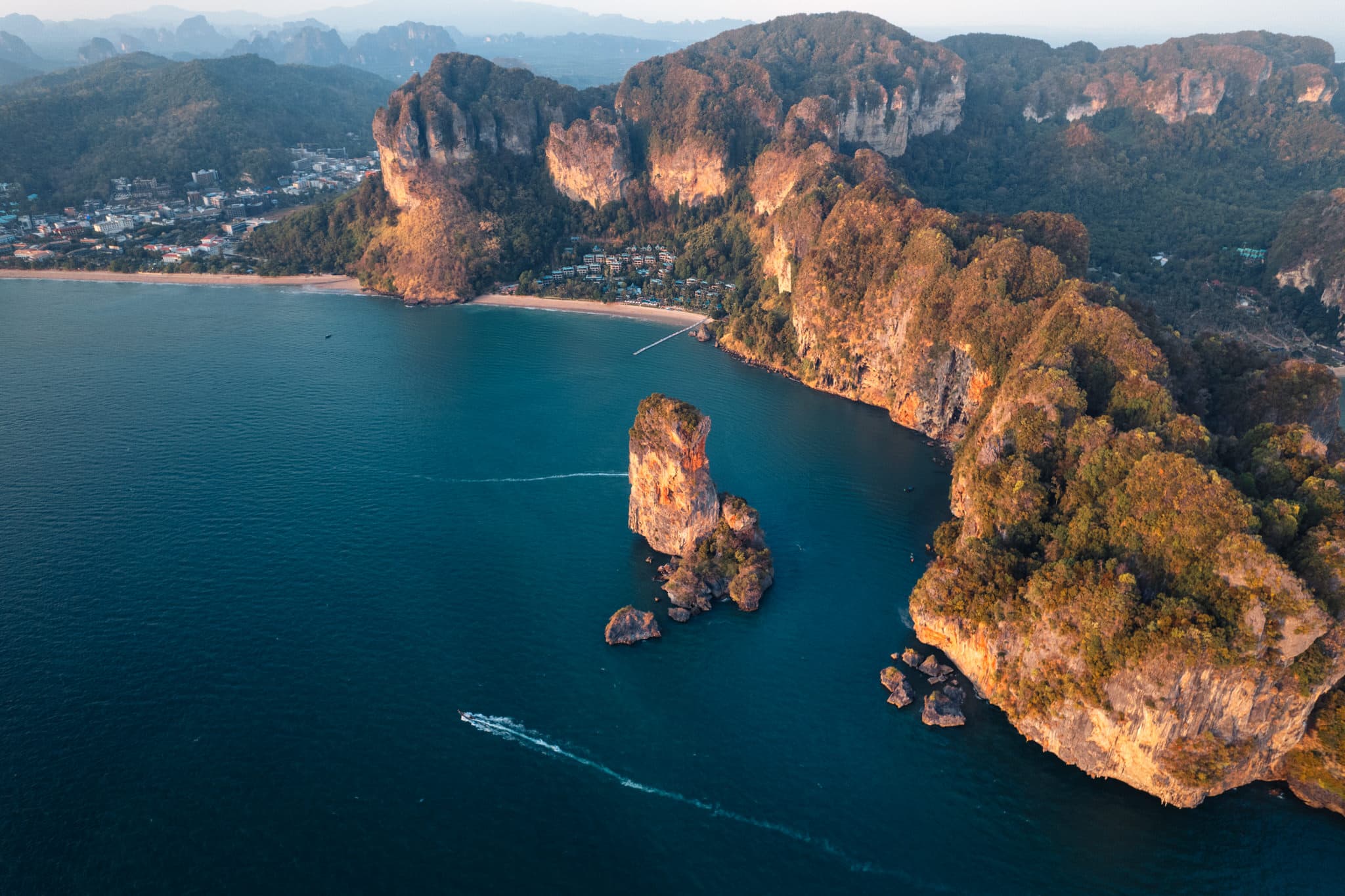 A view of Railay Beach with turquoise waters and limestone cliffs