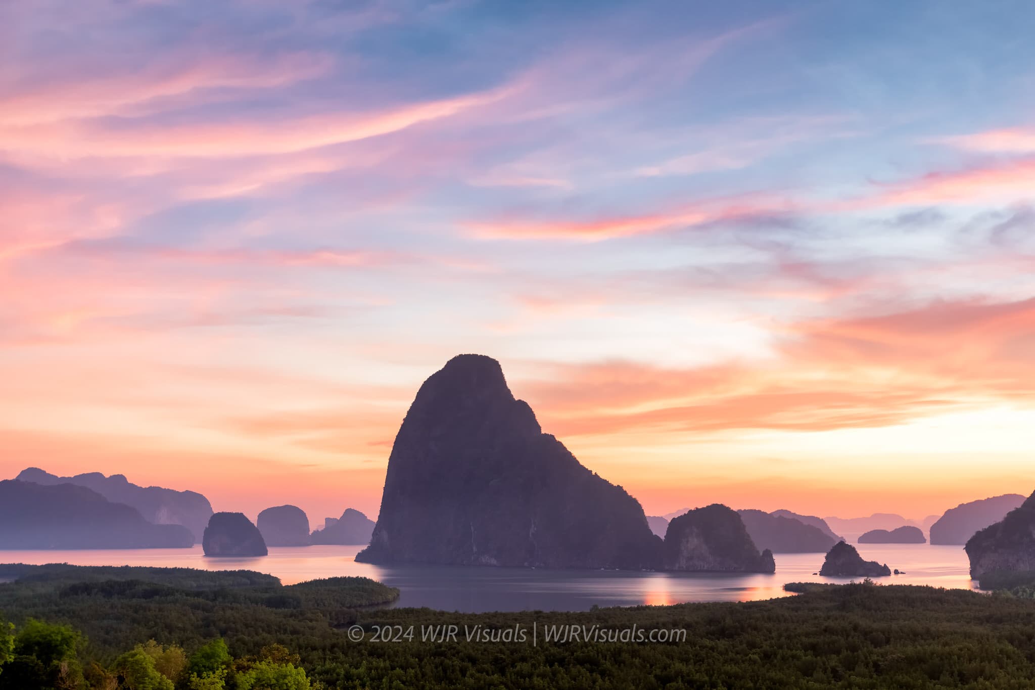 A scenic view of Phang Nga Bay with its iconic limestone karsts